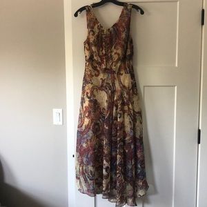 Multicolored paisley print sleeveless dress with asymmetrical drop waist and hem